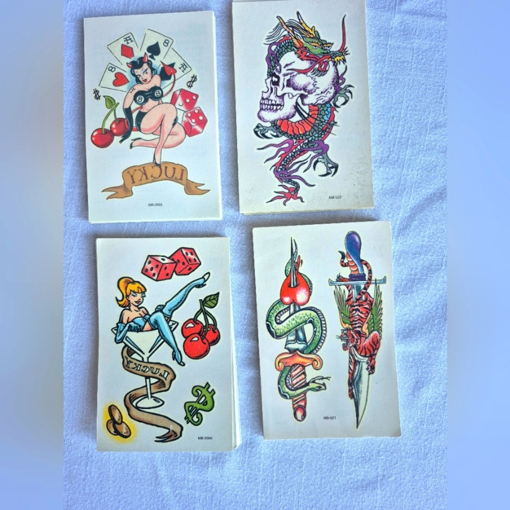 Bundle of 125 Vintage temporary tattoos.